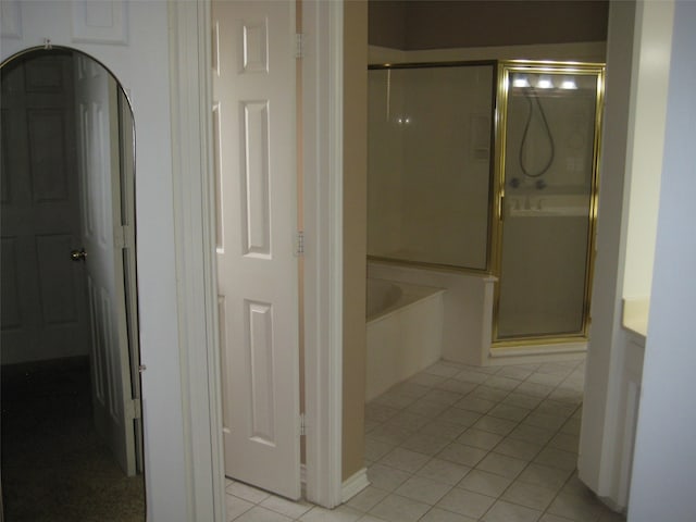 bathroom with tile floors and plus walk in shower