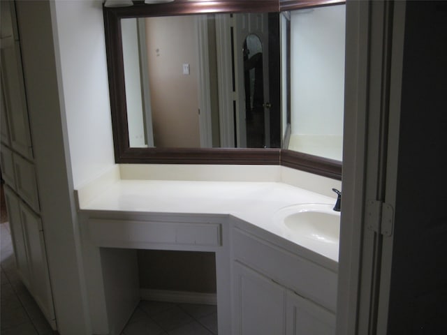 bathroom featuring oversized vanity and tile floors