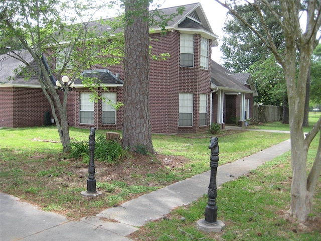 view of front of property with a front lawn