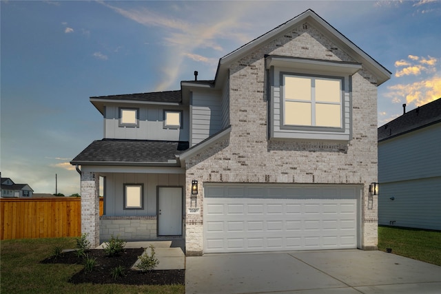 view of front of home with a garage