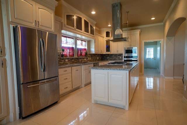 kitchen with a center island, backsplash, stainless steel appliances, light tile floors, and island exhaust hood