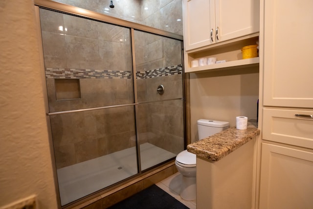 bathroom with walk in shower, tile floors, and toilet