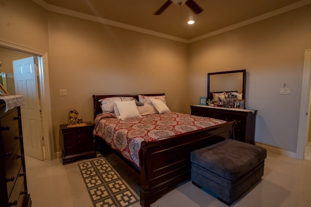 tiled bedroom with ceiling fan and ornamental molding