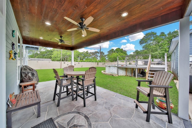 view of patio / terrace featuring ceiling fan