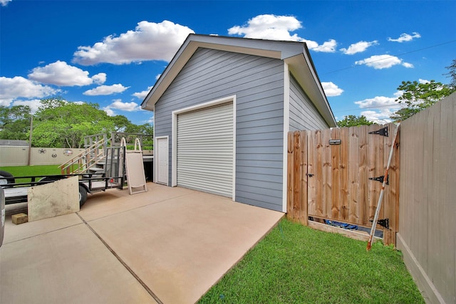 garage with a lawn