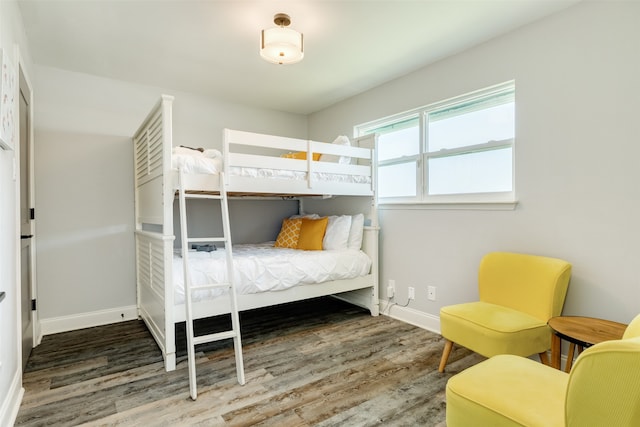 unfurnished bedroom featuring dark wood-type flooring