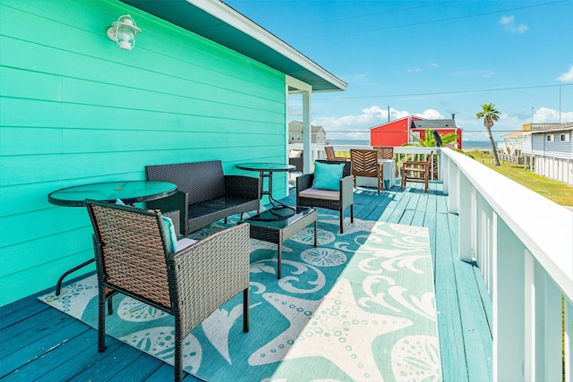 deck featuring outdoor lounge area