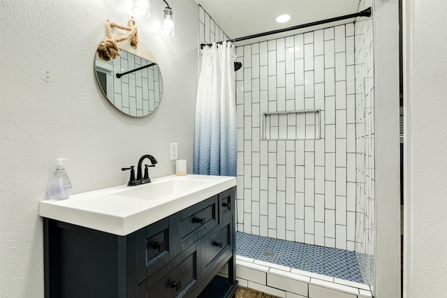 bathroom with vanity and a shower with curtain