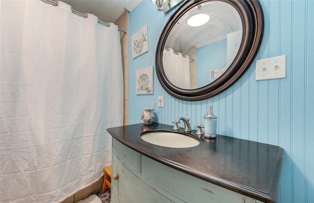 bathroom with vanity and a shower with shower curtain