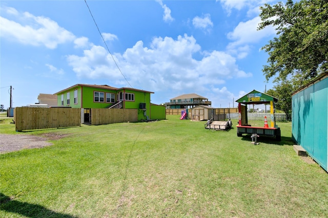 view of yard with a gazebo and a storage shed