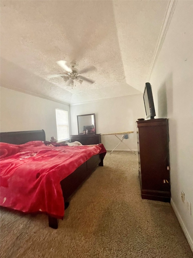 carpeted bedroom with ceiling fan, a textured ceiling, and vaulted ceiling