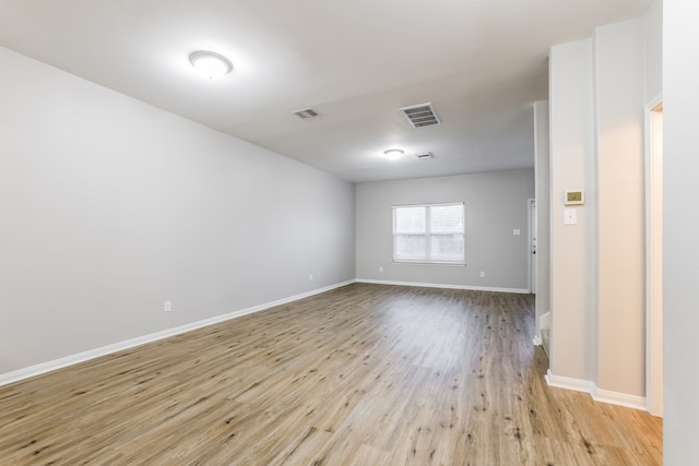 empty room with light wood-type flooring