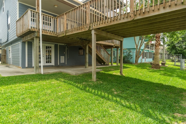 view of yard with a patio and a wooden deck