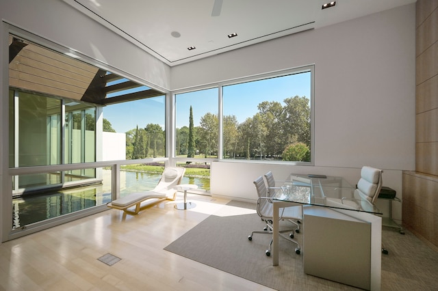 office with light hardwood / wood-style floors