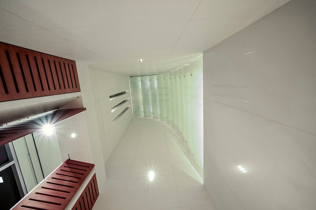 corridor with light tile flooring