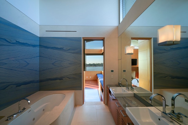 bathroom featuring double vanity and tile flooring