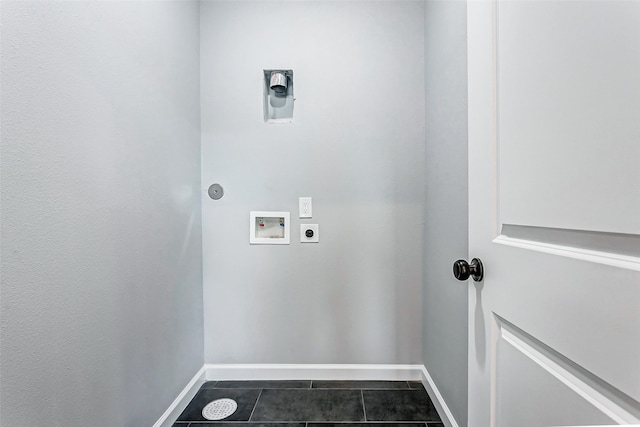 laundry area with hookup for a washing machine, dark tile patterned floors, and electric dryer hookup