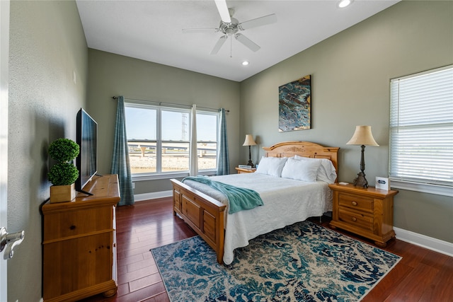 bedroom featuring dark hardwood / wood-style floors and ceiling fan