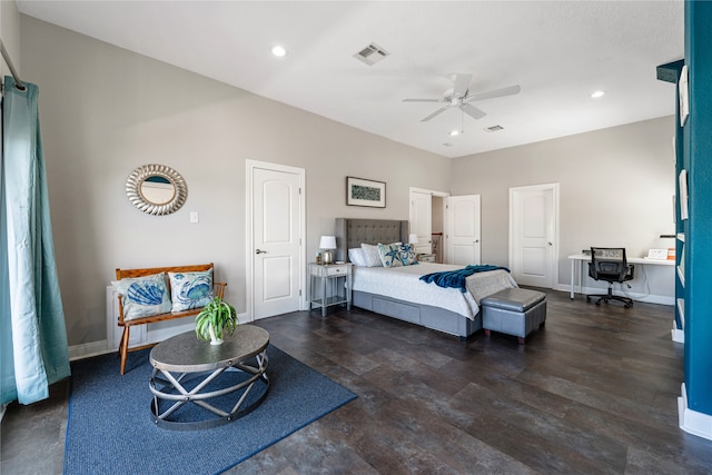 bedroom with dark hardwood / wood-style floors and ceiling fan