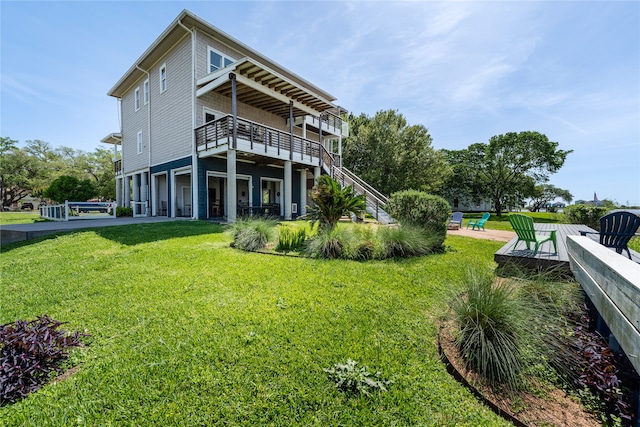 exterior space featuring a wooden deck and a yard