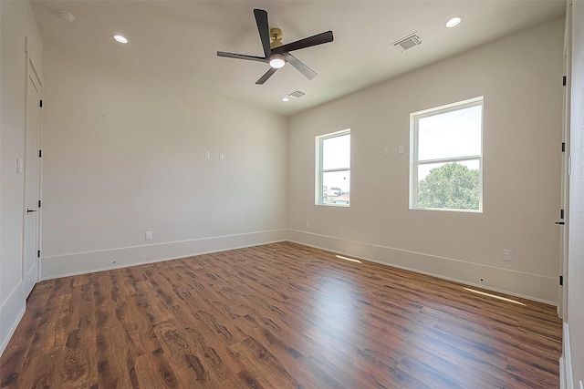 unfurnished room featuring dark hardwood / wood-style floors and ceiling fan