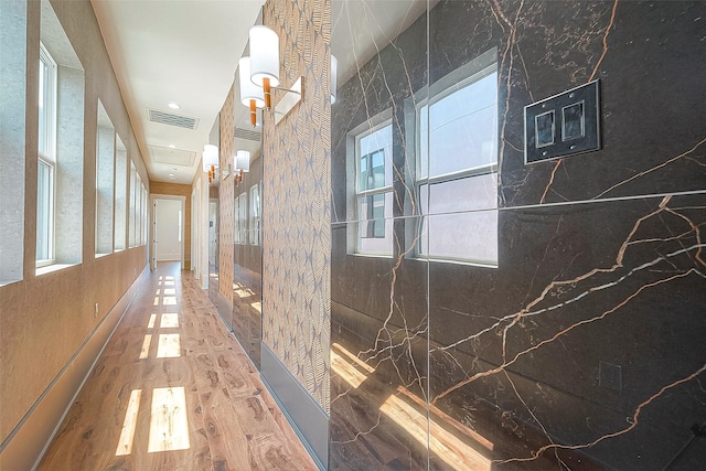 hallway featuring wood-type flooring