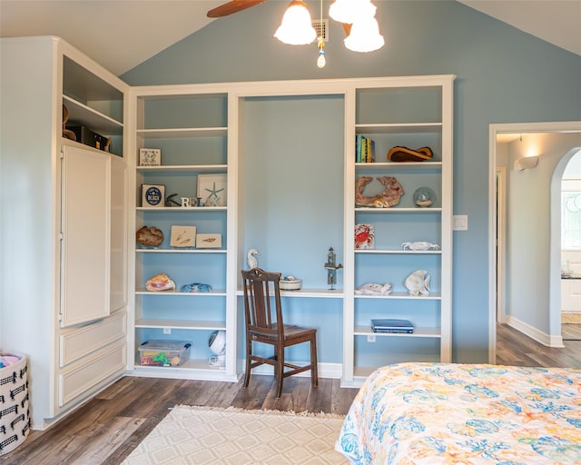 bedroom featuring dark wood-type flooring, ceiling fan, and lofted ceiling