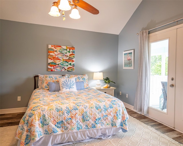 bedroom with access to outside, ceiling fan, wood-type flooring, and lofted ceiling