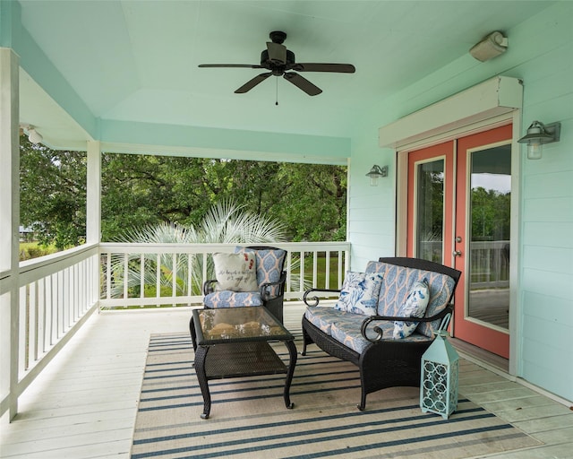 deck featuring ceiling fan and an outdoor hangout area