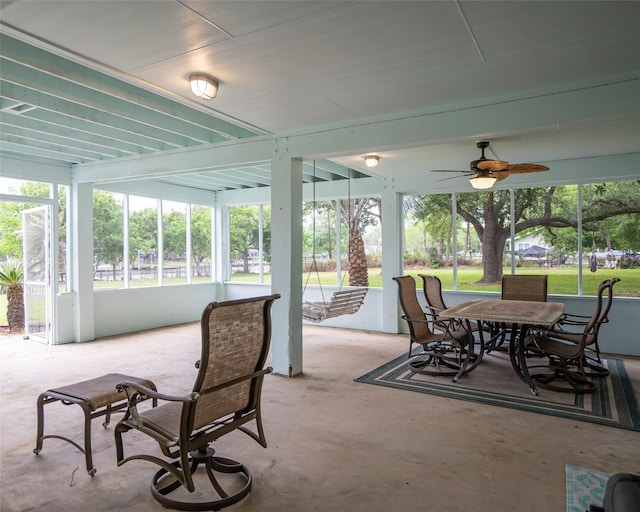 sunroom / solarium with ceiling fan