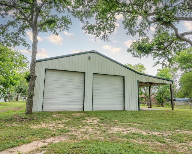 garage with a lawn