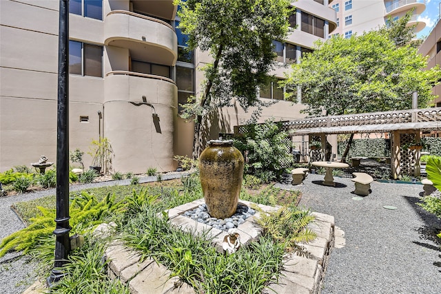 surrounding community featuring a pergola