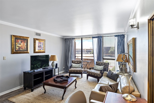 living room with wood-type flooring and crown molding