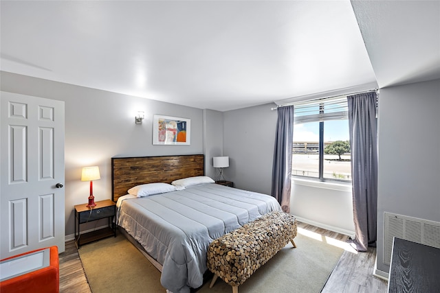 bedroom featuring light hardwood / wood-style flooring