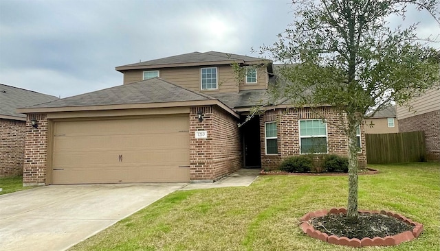 view of front of property with a front lawn and a garage