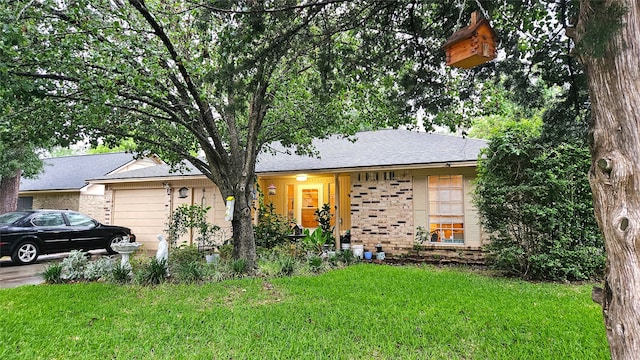 single story home with a front lawn and a garage