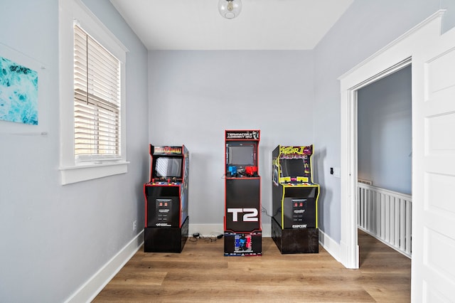 playroom featuring light wood-type flooring