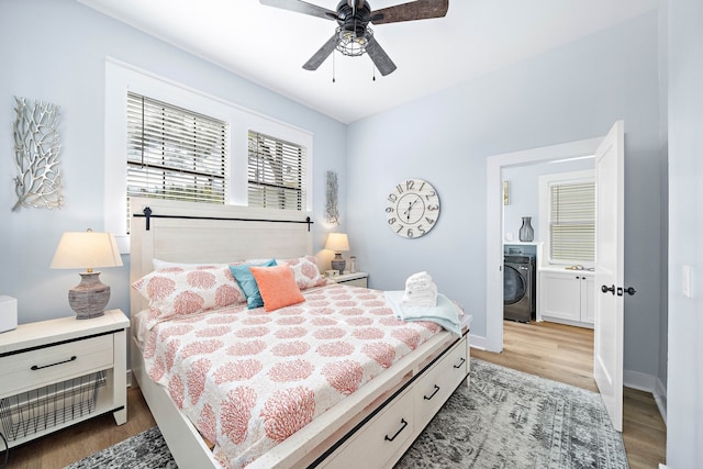 bedroom with light hardwood / wood-style floors, washer / clothes dryer, and ceiling fan