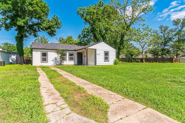 view of front of property with a front lawn