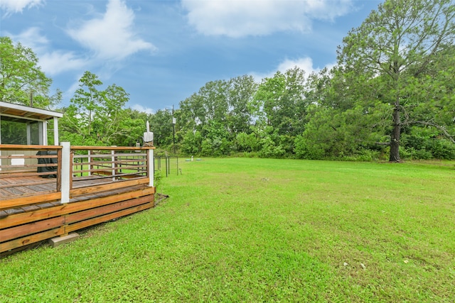 view of yard with a deck