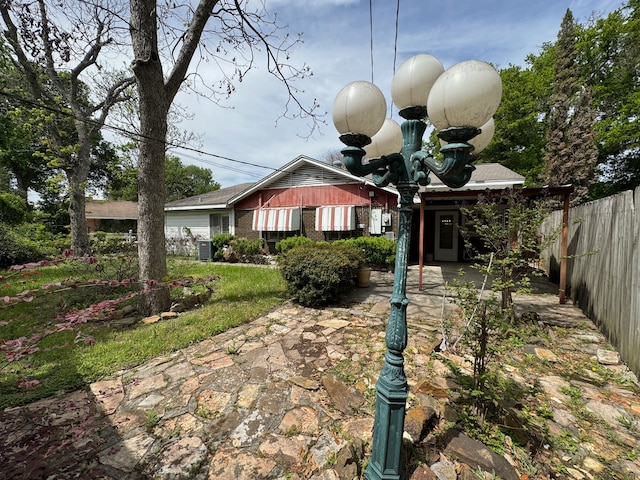 view of front of home with a patio area