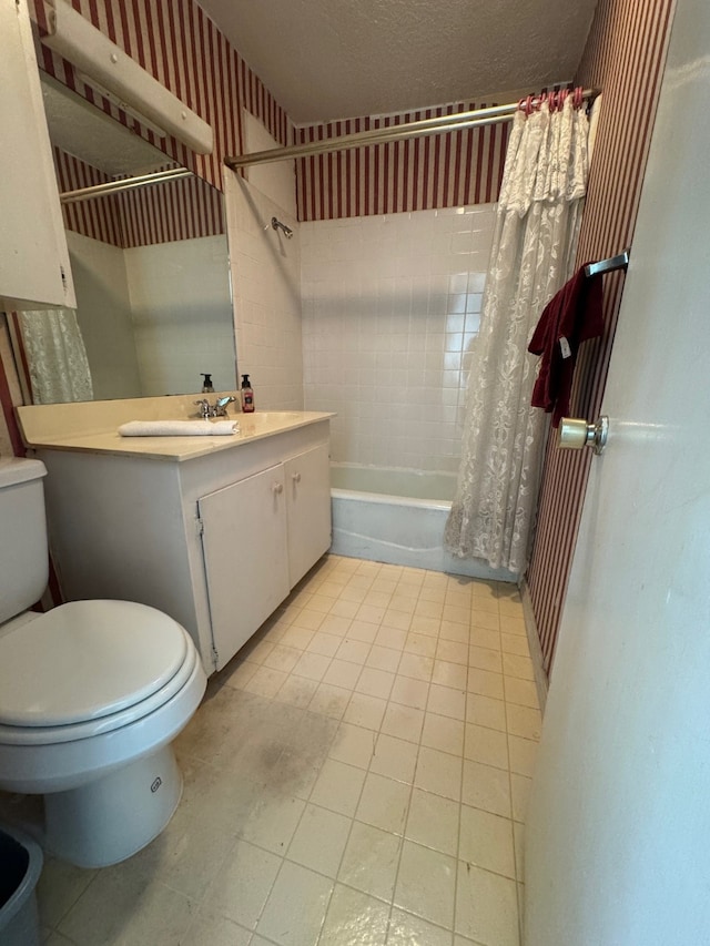 full bathroom featuring tile flooring, vanity, toilet, and shower / bathtub combination with curtain