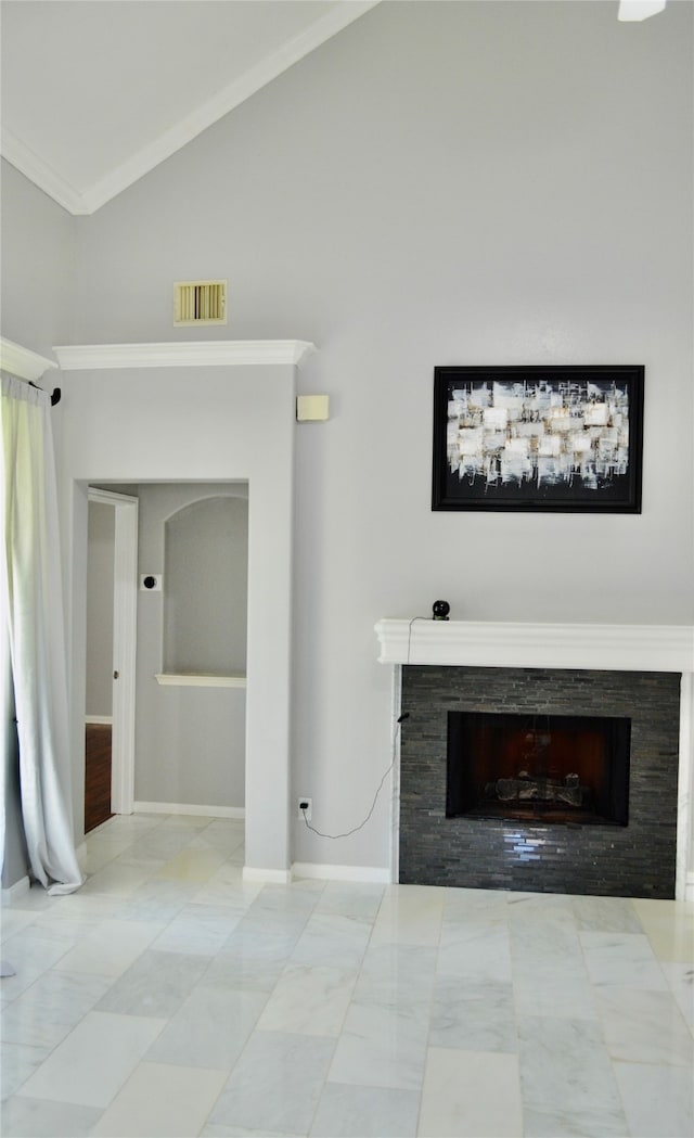 unfurnished living room featuring ornamental molding and high vaulted ceiling