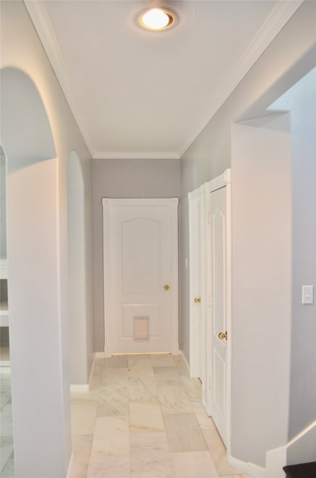 corridor featuring ornamental molding