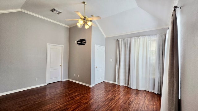 unfurnished room with vaulted ceiling, ceiling fan, crown molding, and dark hardwood / wood-style flooring