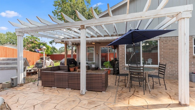 view of patio featuring an outdoor living space, a pergola, and a grill