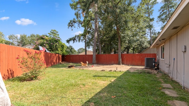 view of yard featuring central AC unit