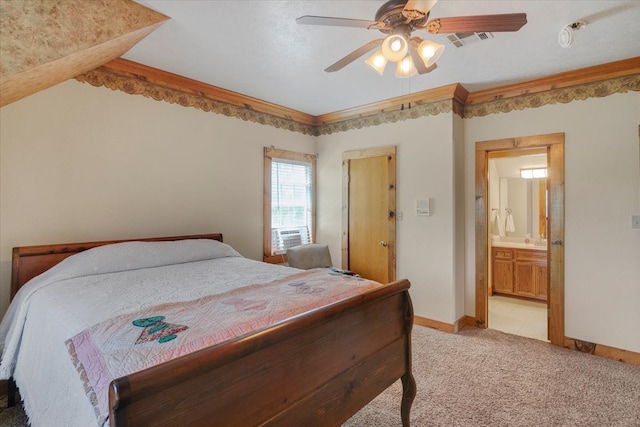 bedroom with ensuite bath, ceiling fan, and light tile floors