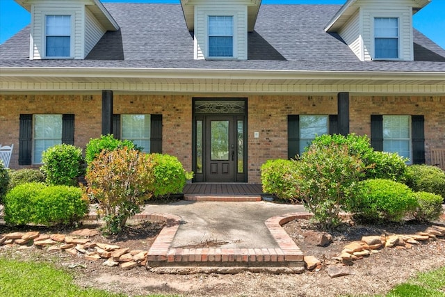 entrance to property with a porch