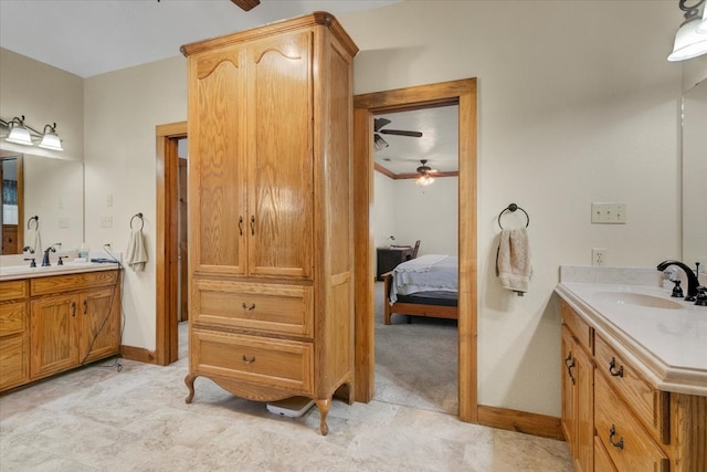 bathroom featuring vanity, tile floors, and ceiling fan